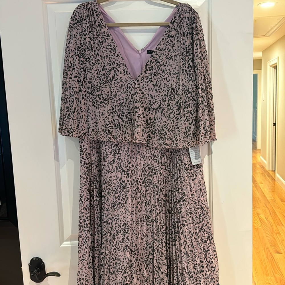 Dress with pleated skirt